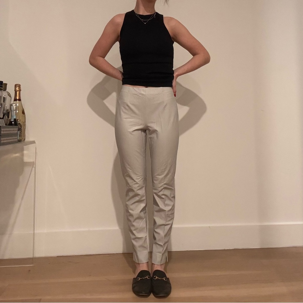 Cream high-waisted ankle pants with relaxed fit and straight leg cut